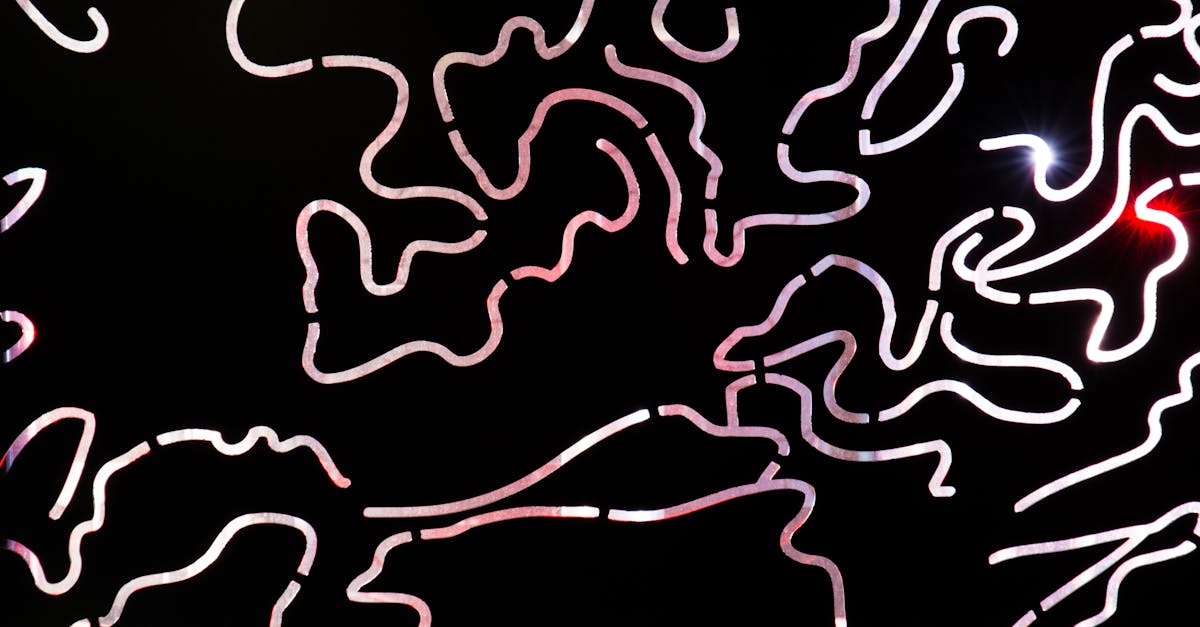 Intriguing abstract lines with glowing edges creating unique patterns on a dark background.