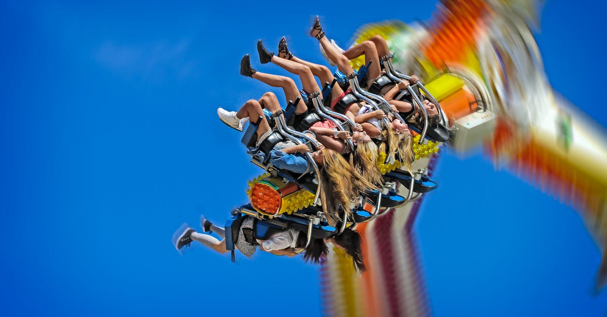 Exciting amusement park ride in Melbourne, Australia with people enjoying the thrill.