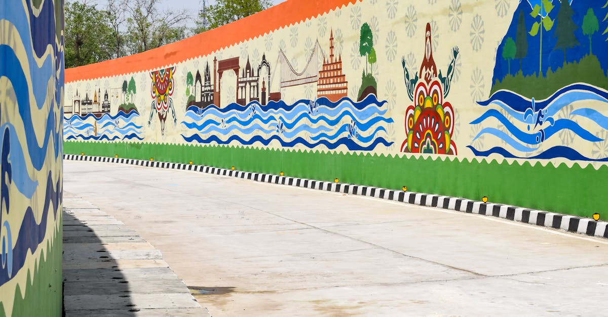 Colorful mural depicting cultural and natural themes on an outdoor wall.