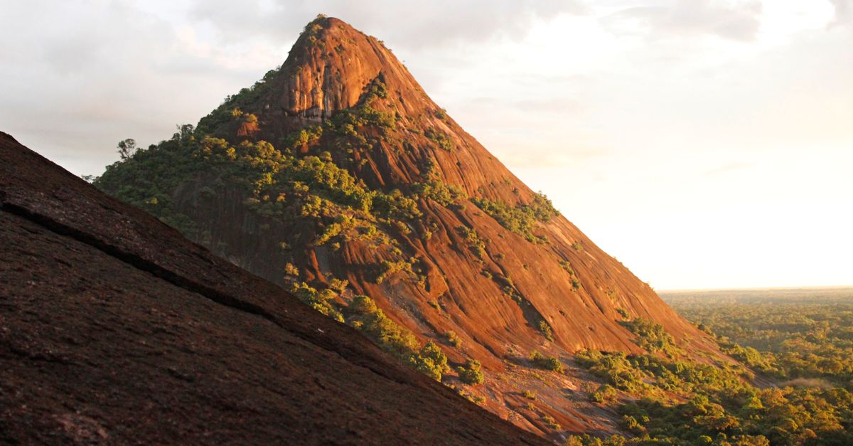 Explore the breathtaking view of Cerros de Mavecure in Inírida, Colombia captured at sunset.