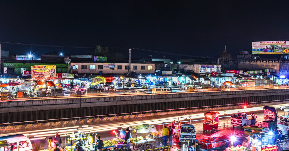 Lively night market illuminated by streetlights and vibrant vendor stalls showcasing local culture.