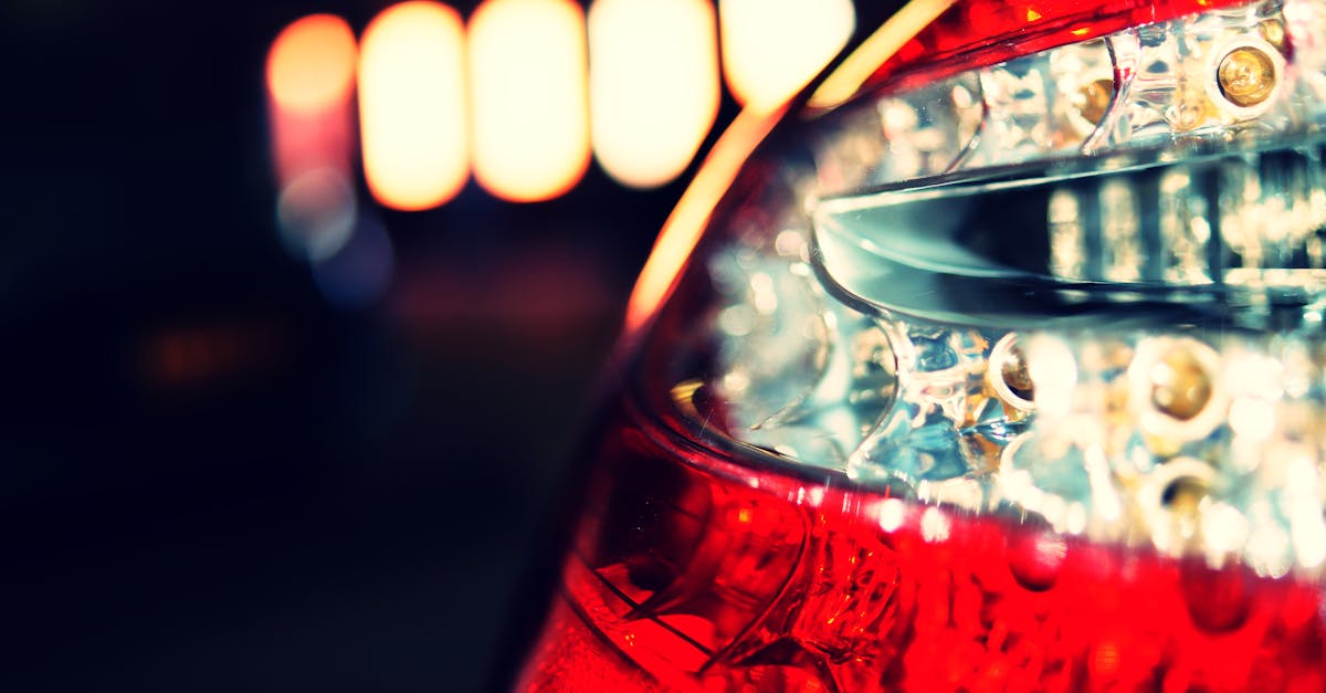Close-up of a car tail light highlighting bokeh and macro photography elements.