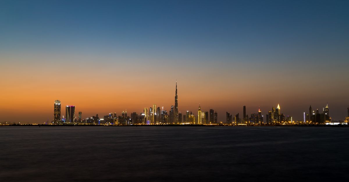 Stunning view of Dubai's skyline at twilight featuring the iconic Burj Khalifa.
