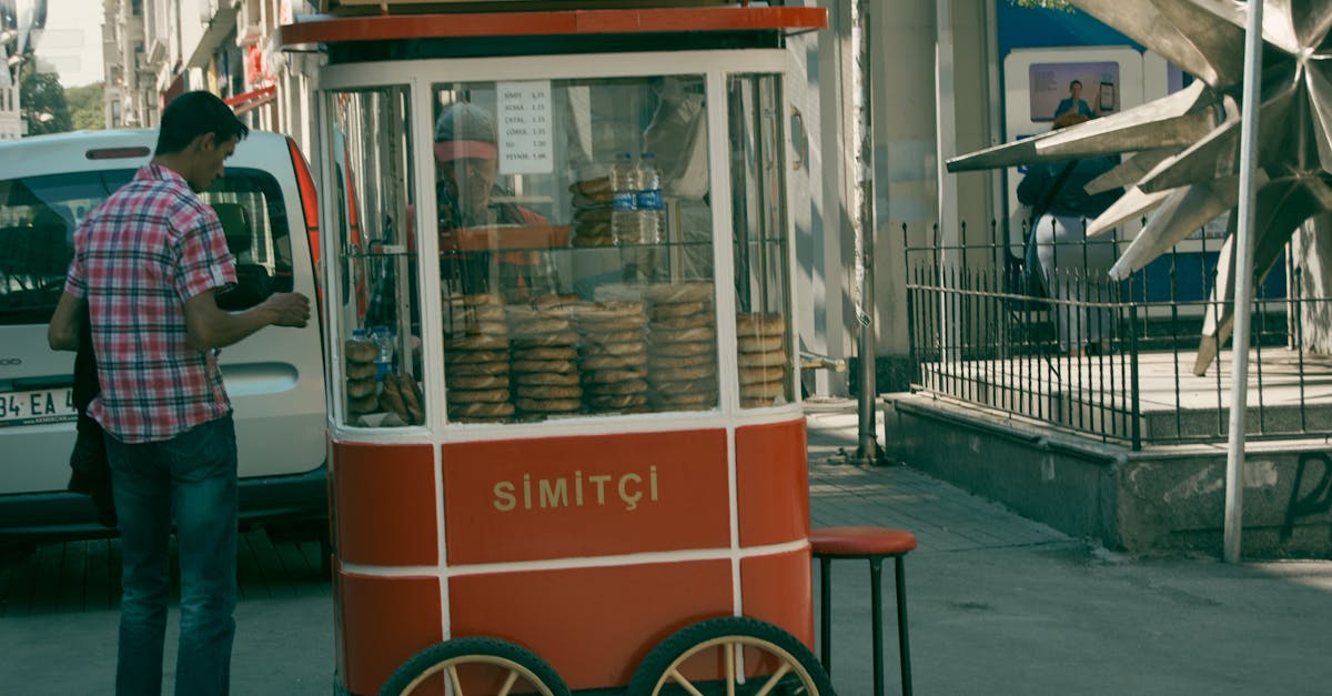 Street vendor with simit cart in Istanbul offers traditional Turkish snacks.