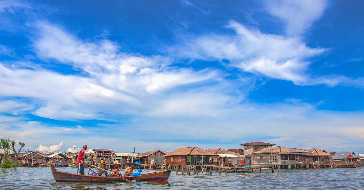 Peaceful lake scene at a floating village in North Sumatra, Indonesia.