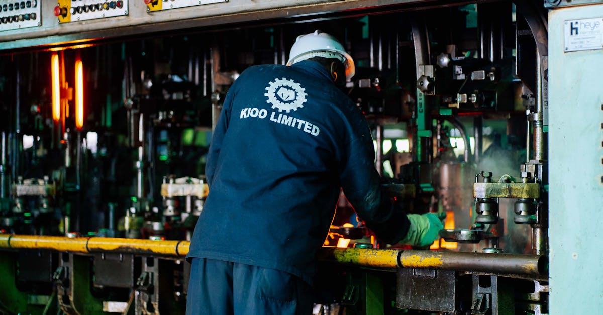 Worker supervises glass production at Kioo Limited factory in Dar es Salaam, Tanzania.