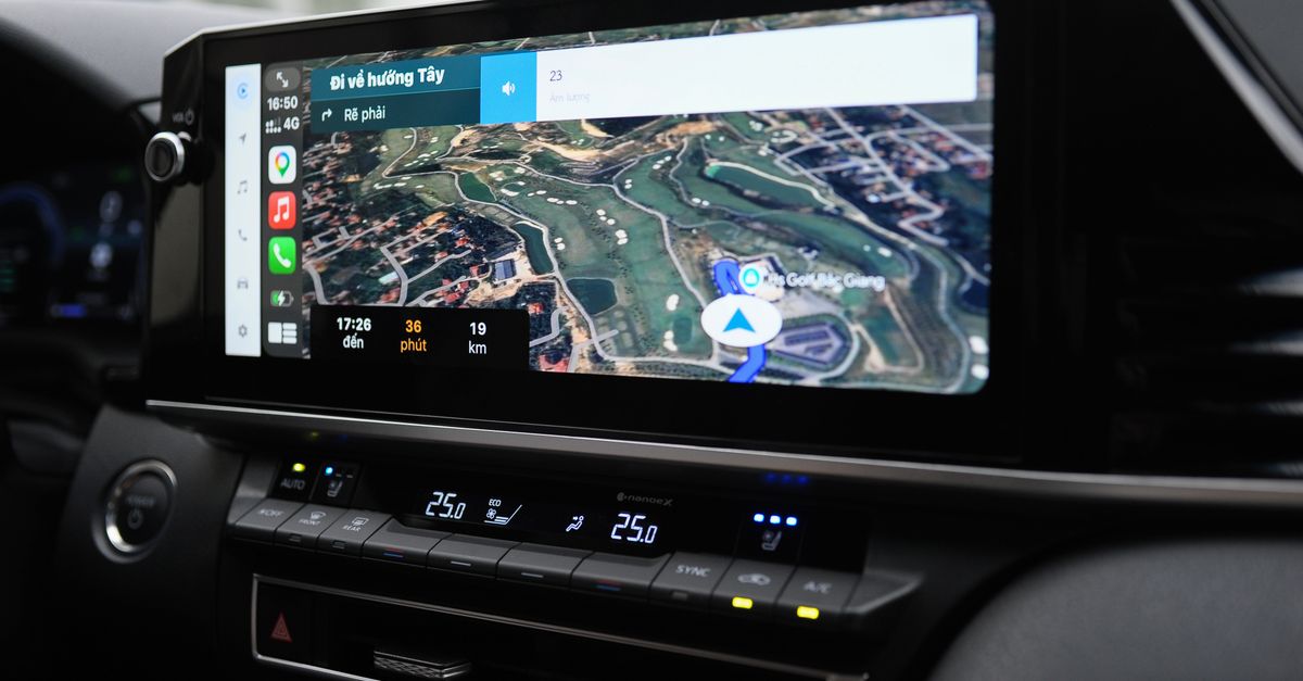 Modern in-car navigation system showing a digital map and route details.
