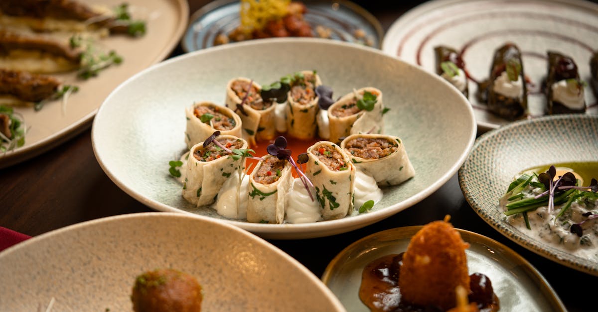 A beautifully arranged gourmet platter featuring a variety of exquisite dishes perfect for a culinary showcase.