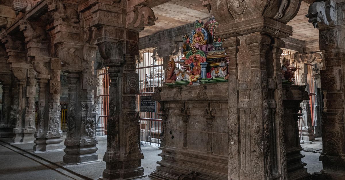Stone carvings and colorful sculptures in a Hindu temple in Tiruchirappalli, Tamil Nadu, India.
