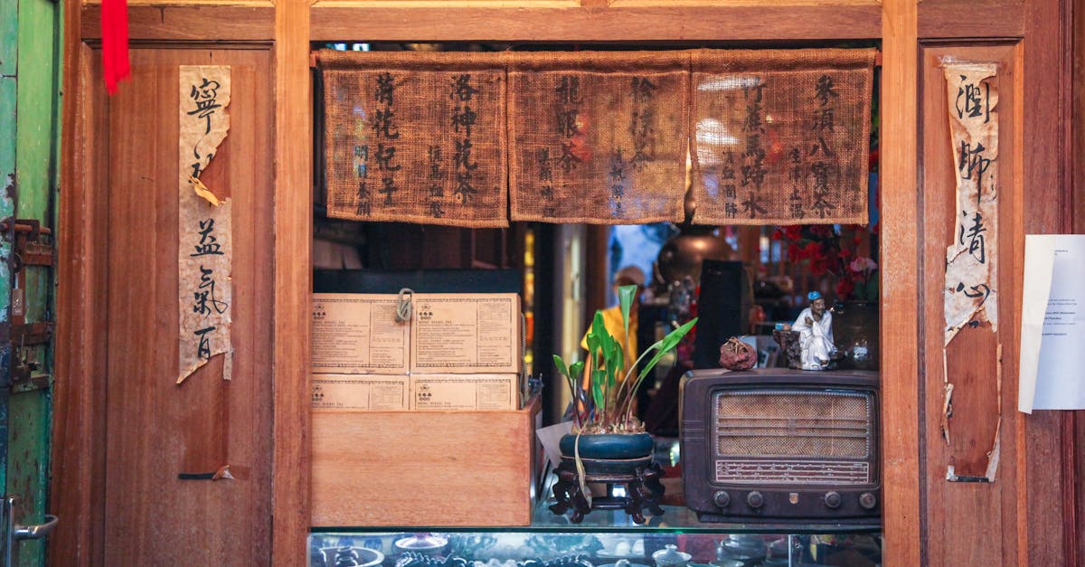 A cozy vintage-style tea room with traditional decor, featuring a retro radio and Chinese calligraphy.