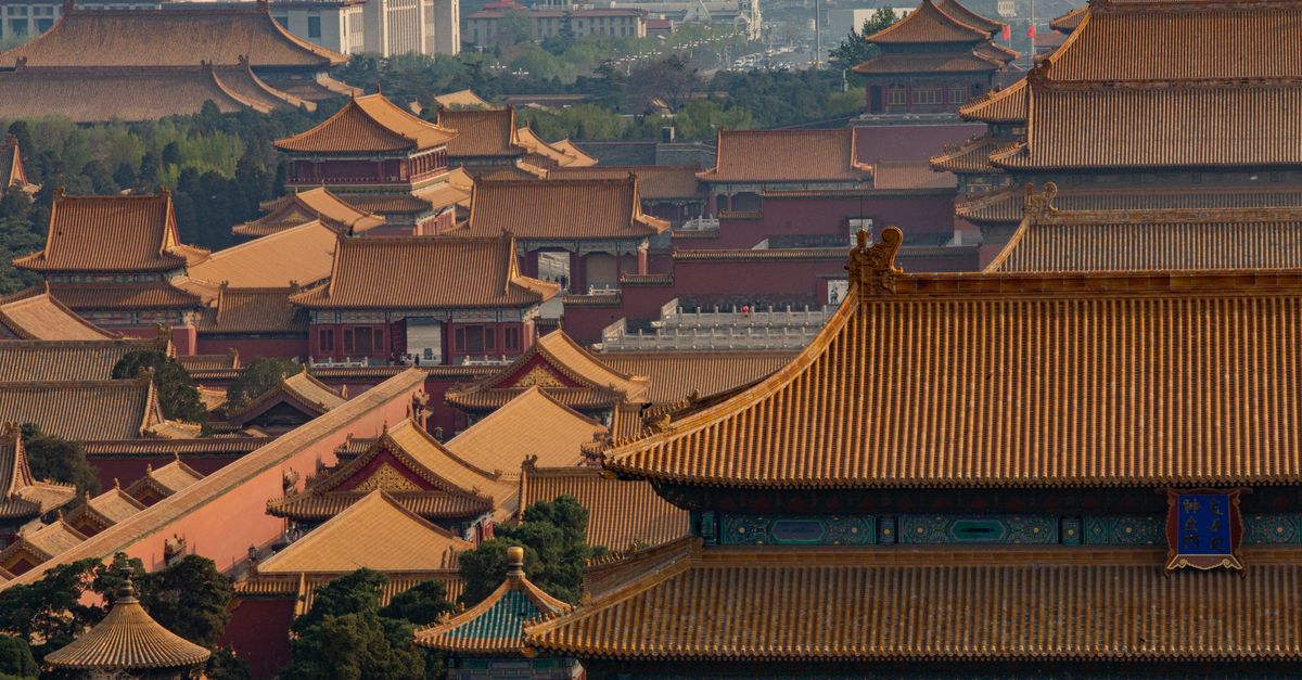 Explore the rich heritage and stunning architecture of Beijing's iconic Forbidden City from above.