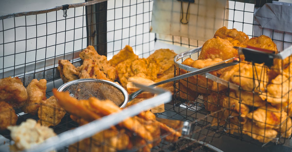 Delicious fried chicken in a street food setting in Bekasi, Indonesia.